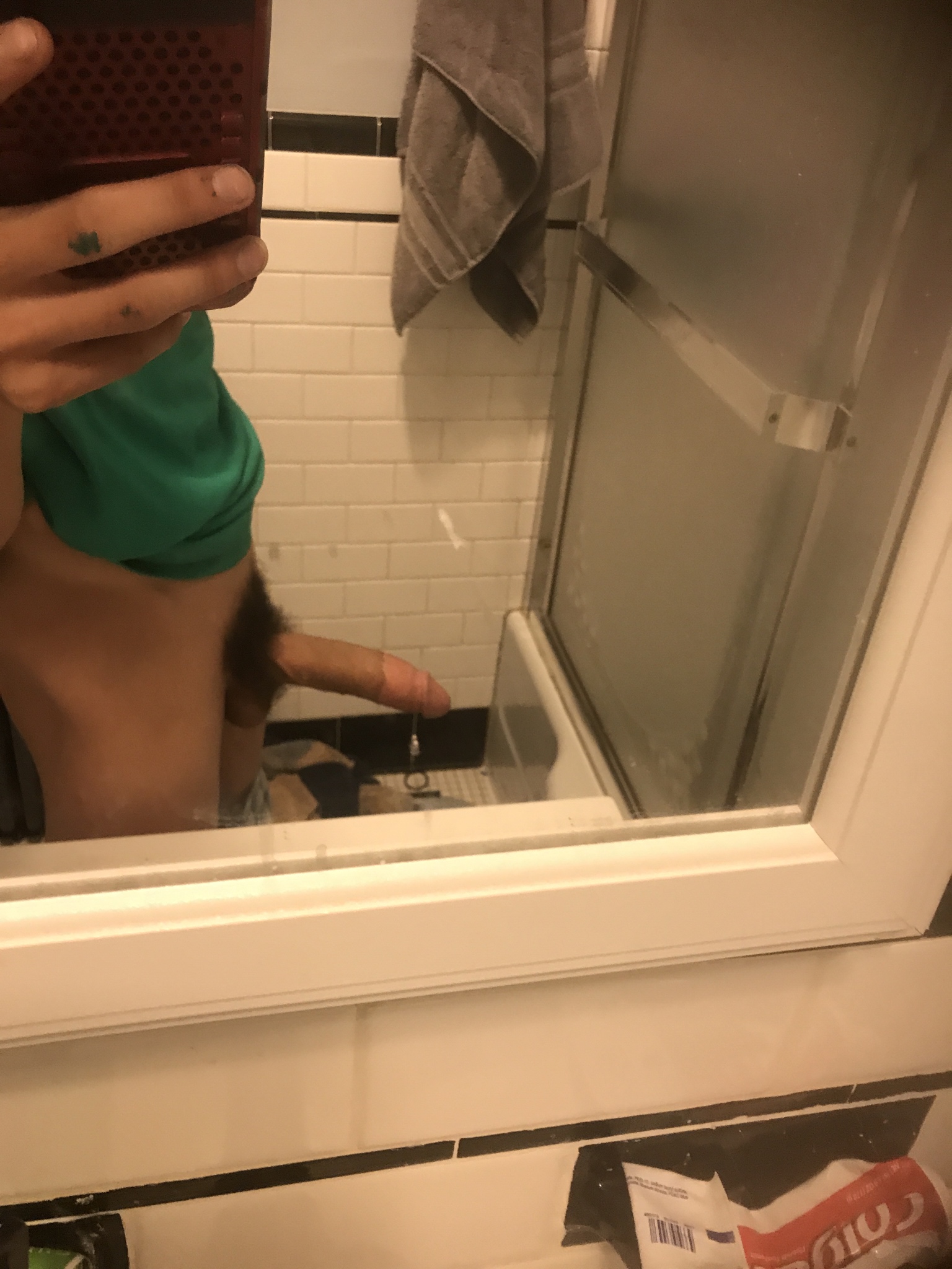 His hard teen cock in the mirror